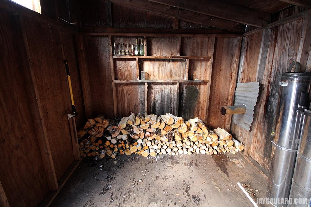 stacked-firewood-in-shed.jpg