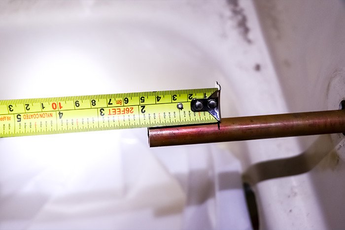measuring-copper-plumbing-pipe.jpg