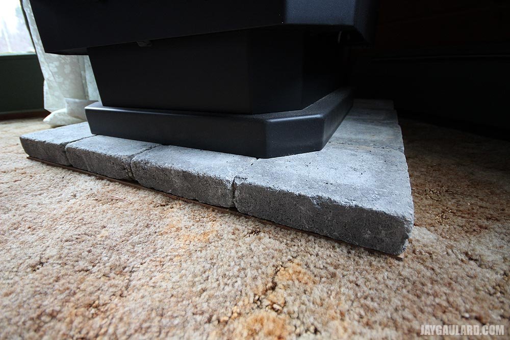 pellet-stove-on-carpet-concrete-pavers.jpg