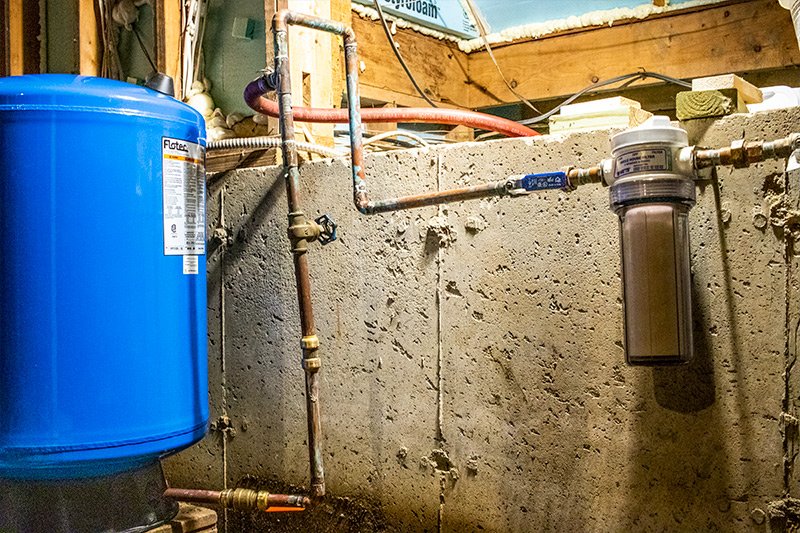 ugly-messy-crooked-plumbing-pipes.jpg