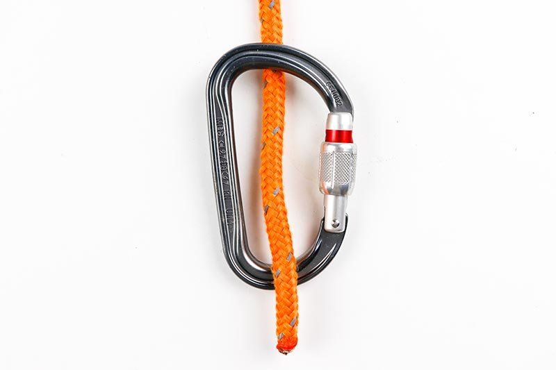 double-fishermans-knot-working-end-through-carabiner.jpg